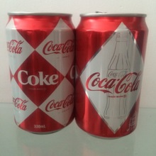 2009年澳门产可口可乐进入澳门60周年纪念套罐