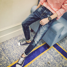 韩版学生秋季男士牛仔修身型青年潮流弹力破洞长裤显瘦泼墨小脚裤